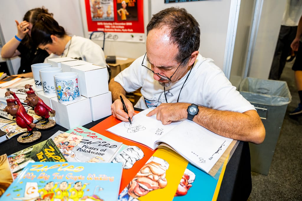 Legendary cartoonist Zapiro on Artist Alley in 2023