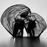Black and white image of dancers in studio