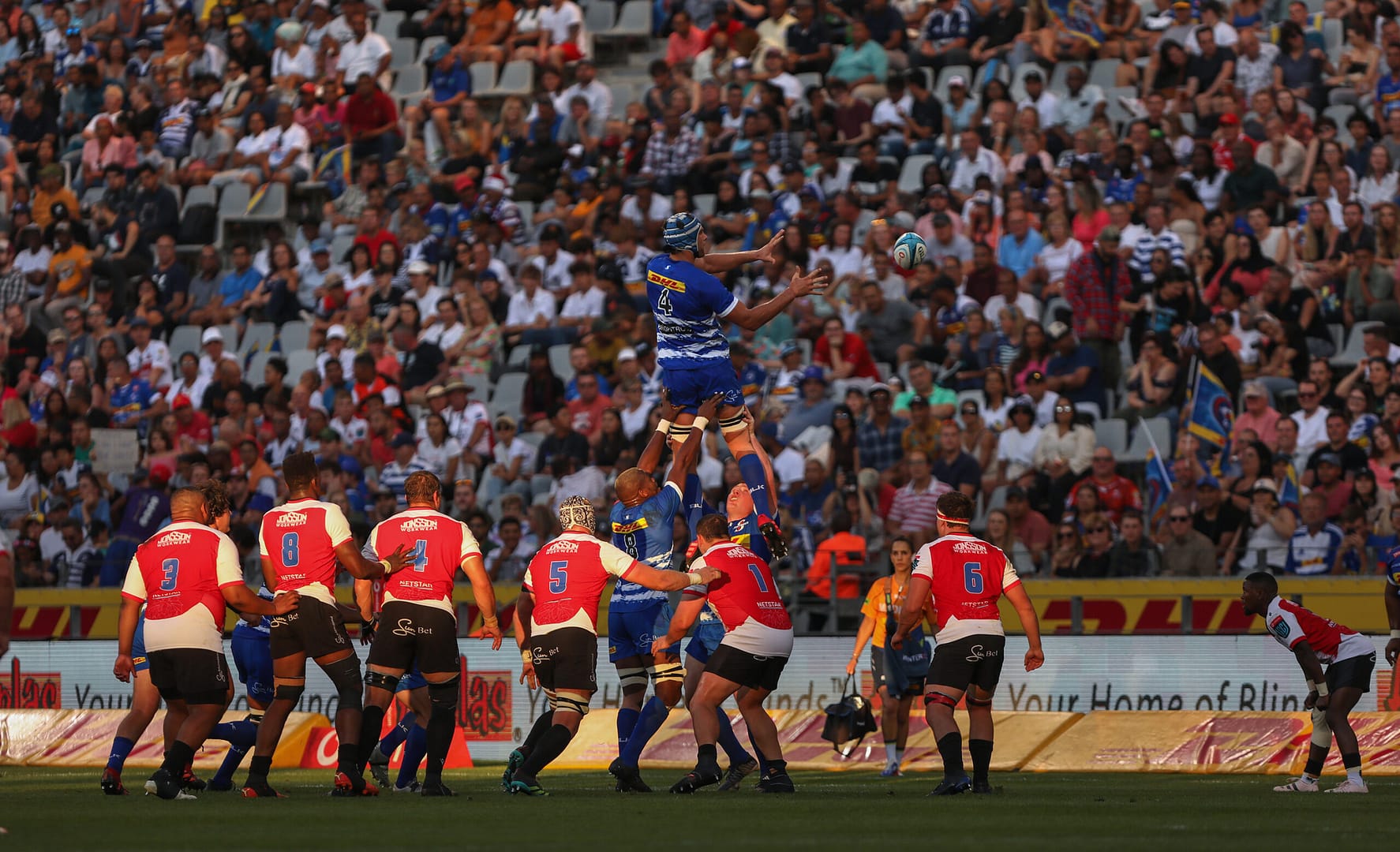 DHL Stormers players go for a line out during a game against the Lions
